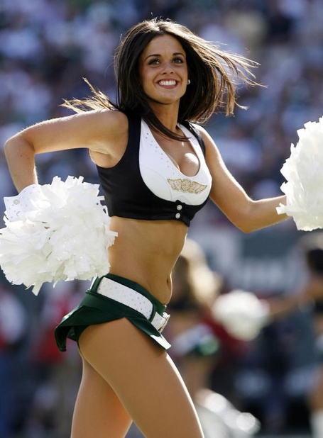 The-new-york-jets-flight-crew-cheerleaders-dance-in-a-game-against-the-new-england-patriots-in-week-two-of-the-nfl-season-at-giants-stadium-in-new-jersey_5_1_medium