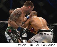 Frankie Edgar beats B.J. Penn at UFC 112 in Abu Dhabi.